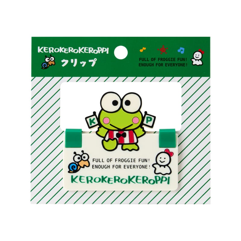 Keroppi large paper clip holding a stack of papers on a desk