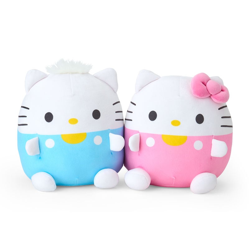 Front view of Hello Kitty and Dear Daniel throw pillows styled on a bed