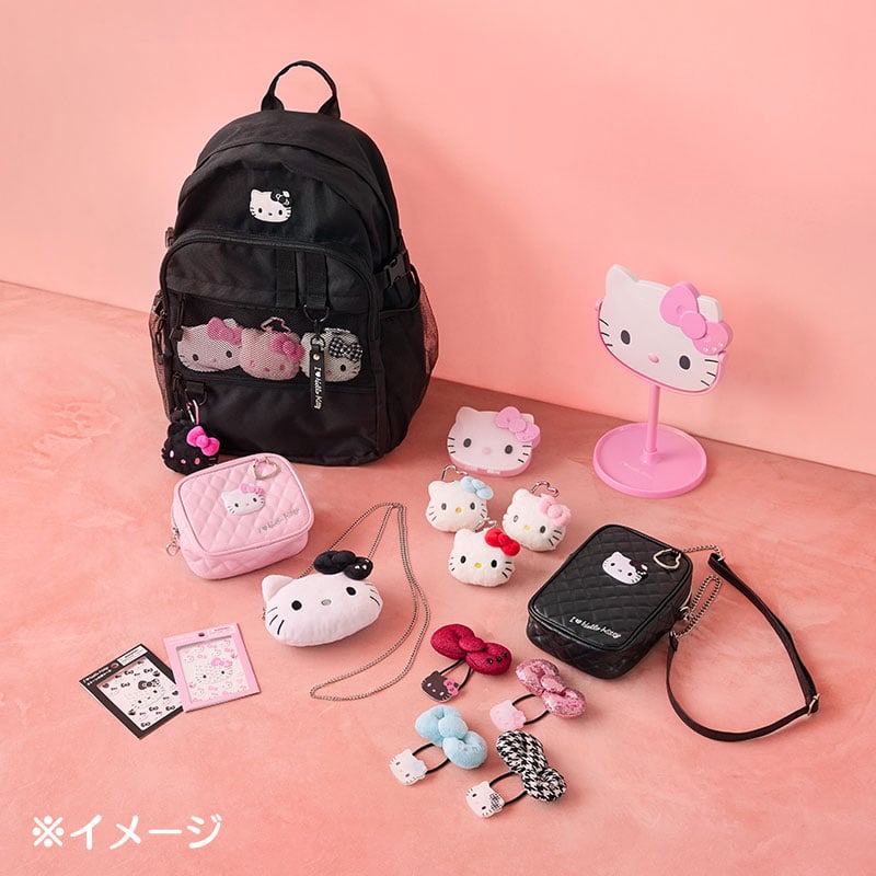 Hello Kitty mini black crossbody bag with chain strap and heart-shaped zipper pull