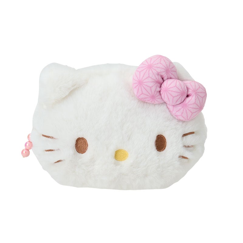 Hello Kitty cosmetic pouch open, showing pastel interior and slip pocket