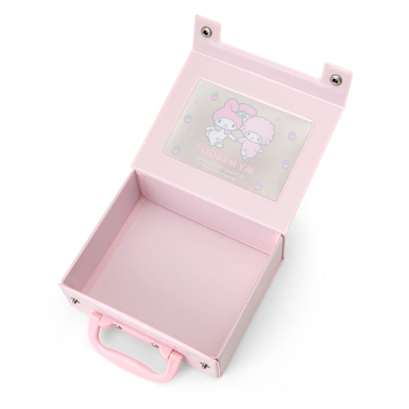 Close-up of the snap closure on the My Melody mini storage suitcase.