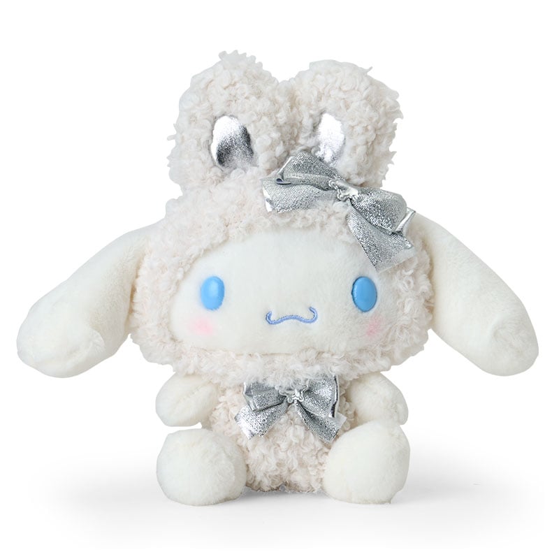 Cinnamoroll snow bunny plush displayed on a winter-themed shelf