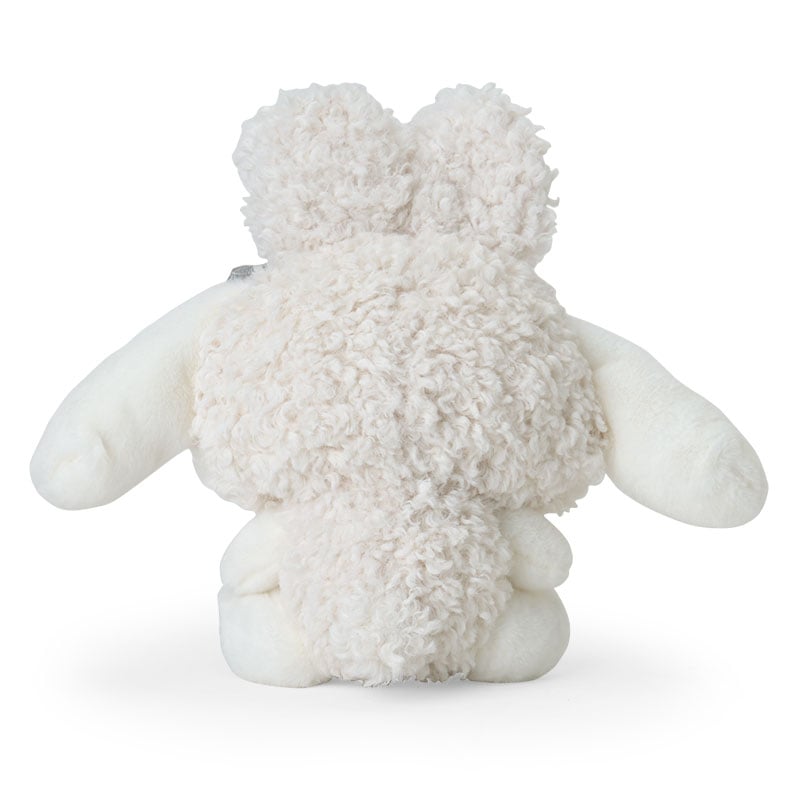 Side view of the axolotl plush toy, highlighting its cuddly design and Sanrio-inspired style.