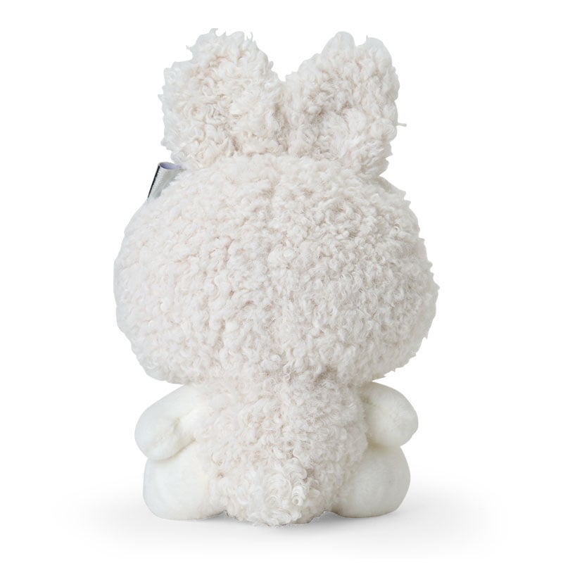 Snowy Kuromi Bunny Plush Toy placed in a cozy winter setting, perfect for seasonal decor.
