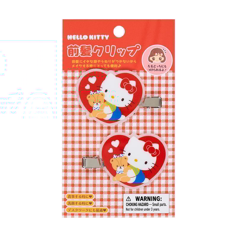Close-up of a single Hello Kitty mini hair clip, highlighting its acrylic material and retro design.