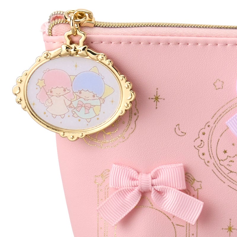 Kiki & Lala mini zipper pouch with pastel frame design, being used as a cute tote bag for small accessories