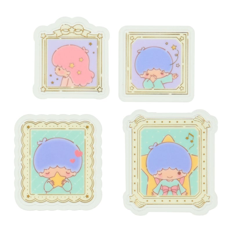 Mini sticker pack displayed on a journal next to crafting supplies