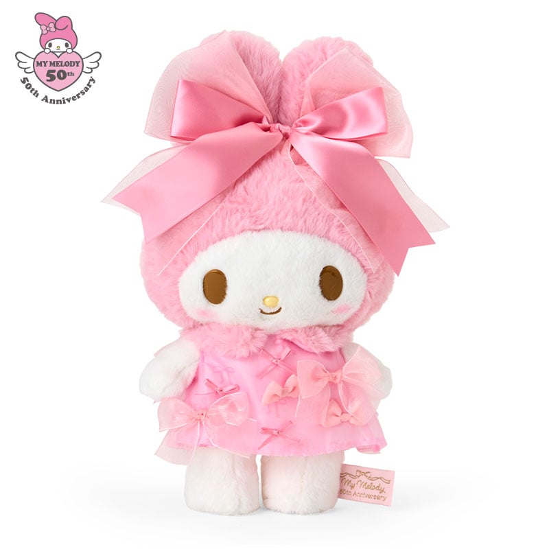 Close-up of My Melody plush toy showcasing ribbon accents and hand-painted cheeks