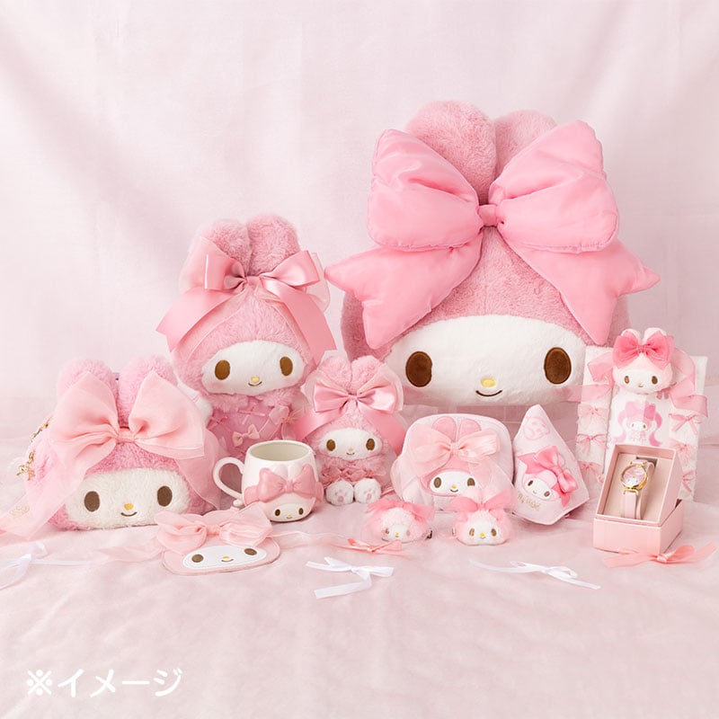 My Melody plush with oversized ribbon detail in a cozy setting