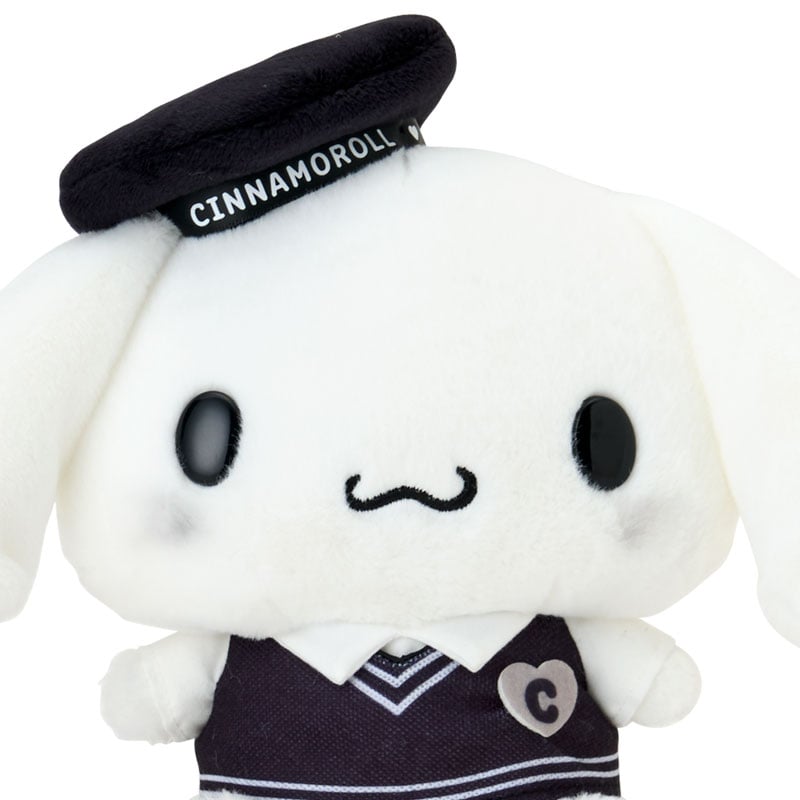 Cinnamoroll plush toy highlighting embroidered heart and ruffle details from the side
