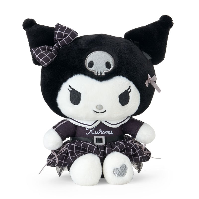 Close-up of the Kuromi plush doll showcasing its houndstooth design.