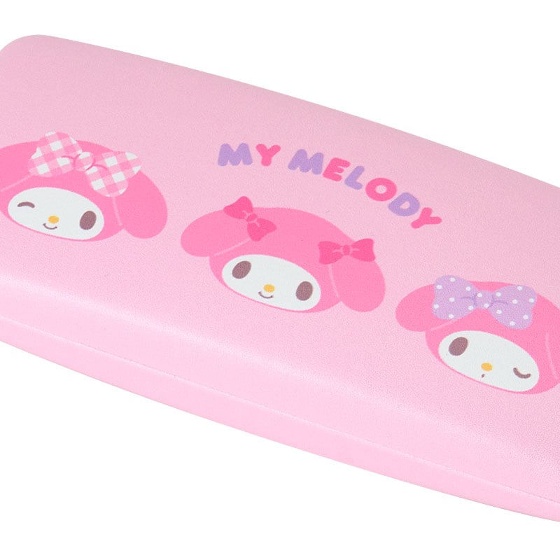 My Melody hard shell eyeglasses case with character artwork on a desk