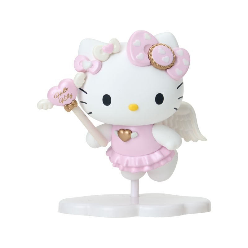 Front view of Hello Kitty figurine with pedestal inside display box