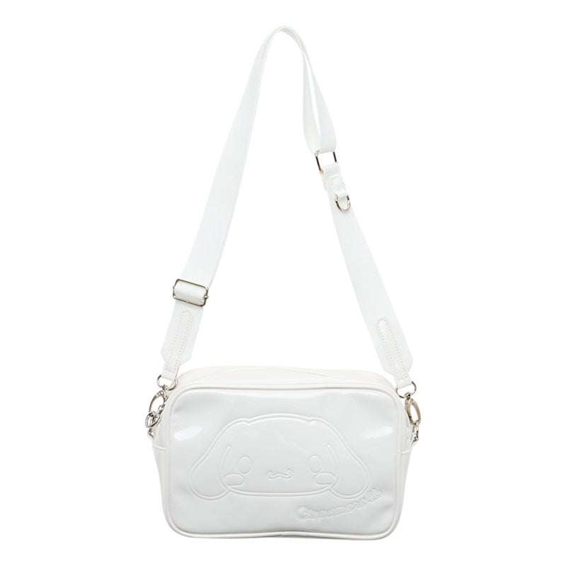 Close-up of silver houndstooth fabric and Cinnamoroll embroidery on crossbody bag