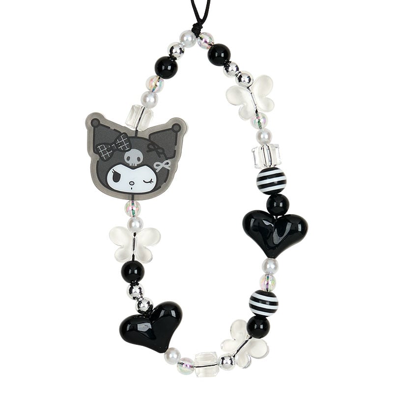 Close-up of the Kuromi charm set showing detailed embroidery and playful design