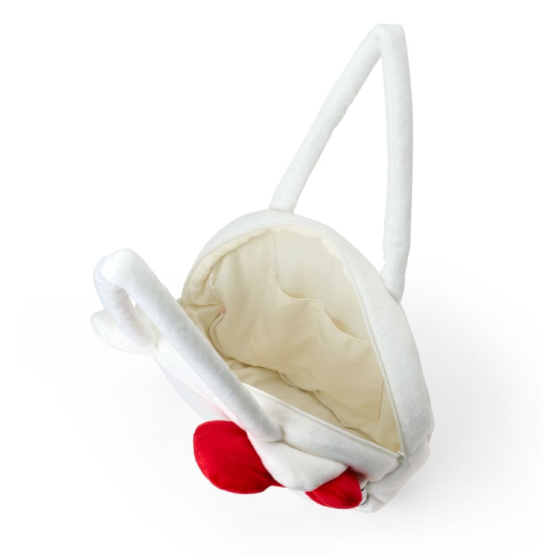 Interior of Hello Kitty tote bag showing slip pockets for organization