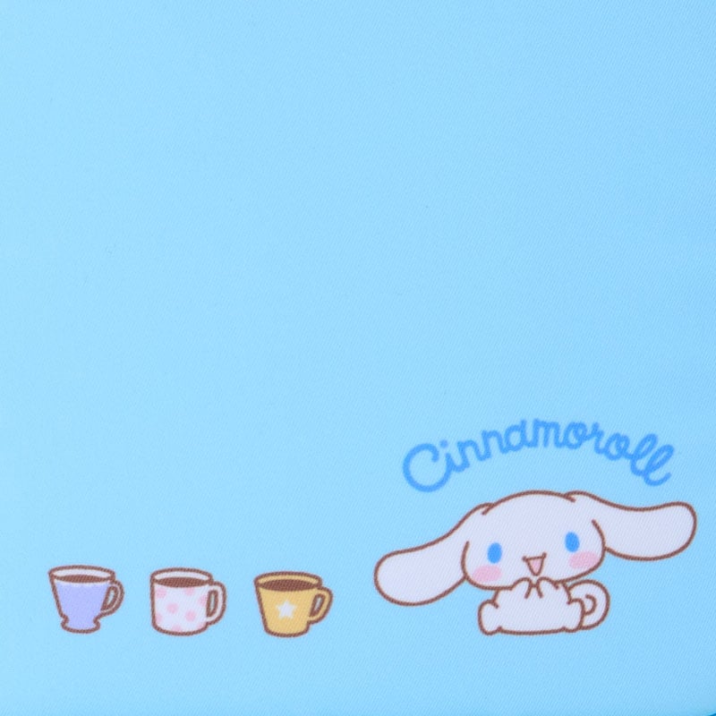 Close-up of Cinnamoroll stationery pouch with flip-top open, showing interior compartments