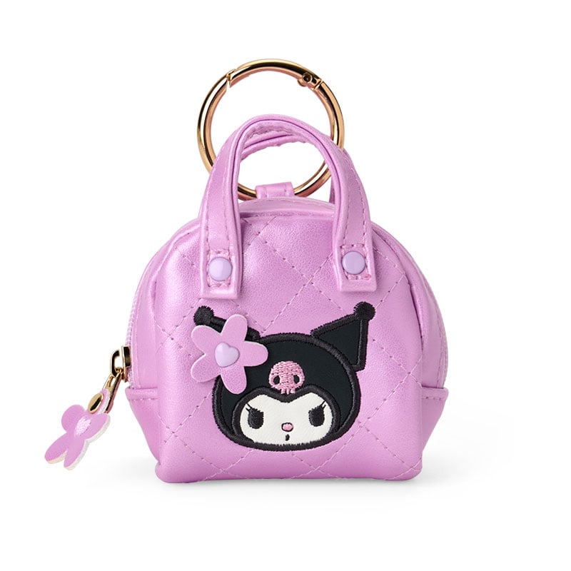 Kuromi bag charm hanging from a tote strap, showcasing quilted details