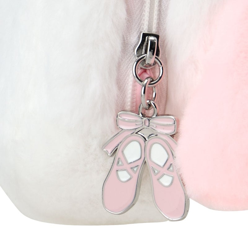 Close-up of the zipper pull and intricate embroidered details on the pouch.