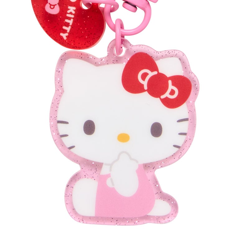 Hello Kitty phone charm attached to an iPhone case
