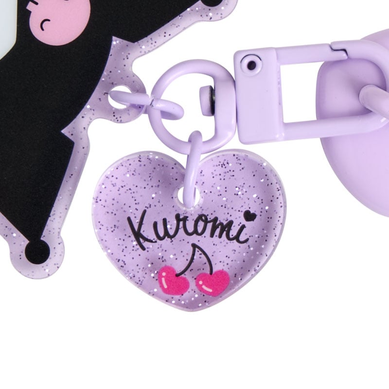 Detailed view of the adhesive backing of the Kuromi phone charm, showing how it attaches.