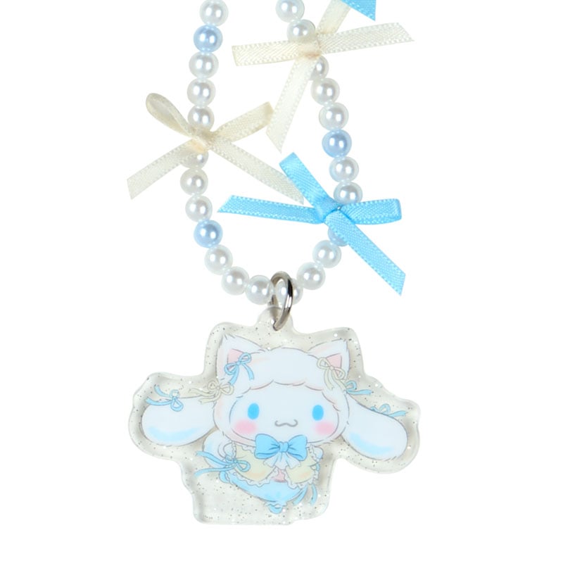 Beaded Sanrio phone accessory attached to iPhone case