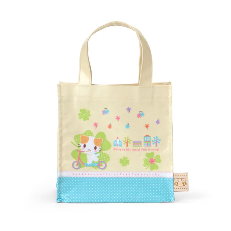 Masyumaro mini tote bag displayed with plush charm and accessories.