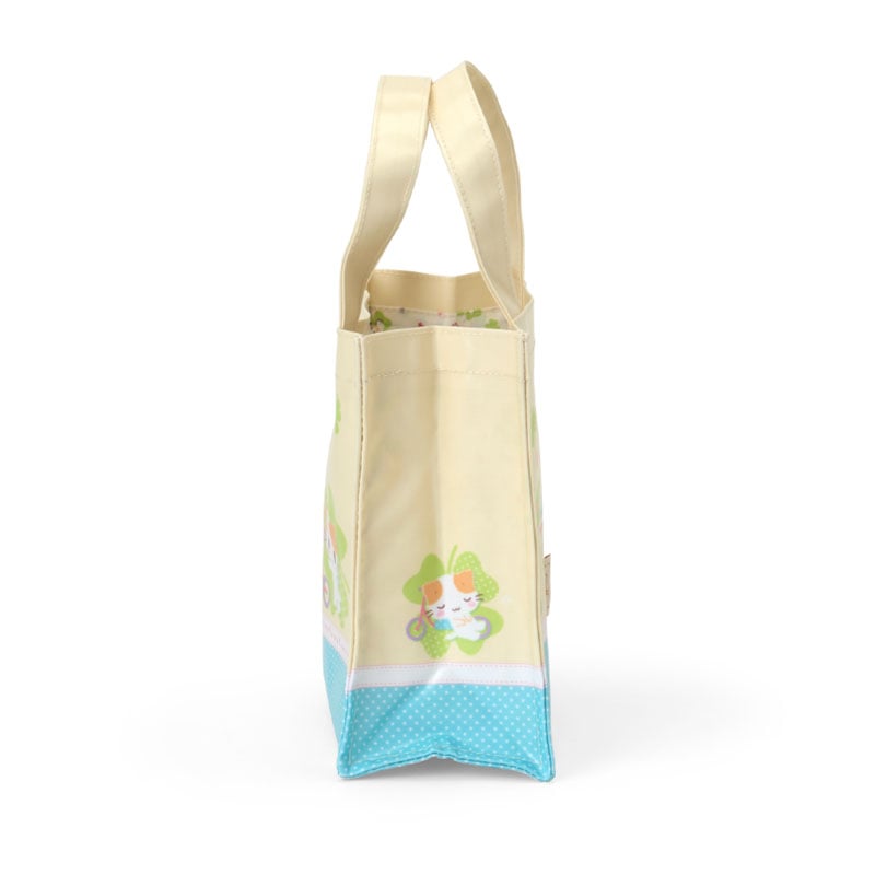 Masyumaro mini tote bag displayed with plush charm and accessories.