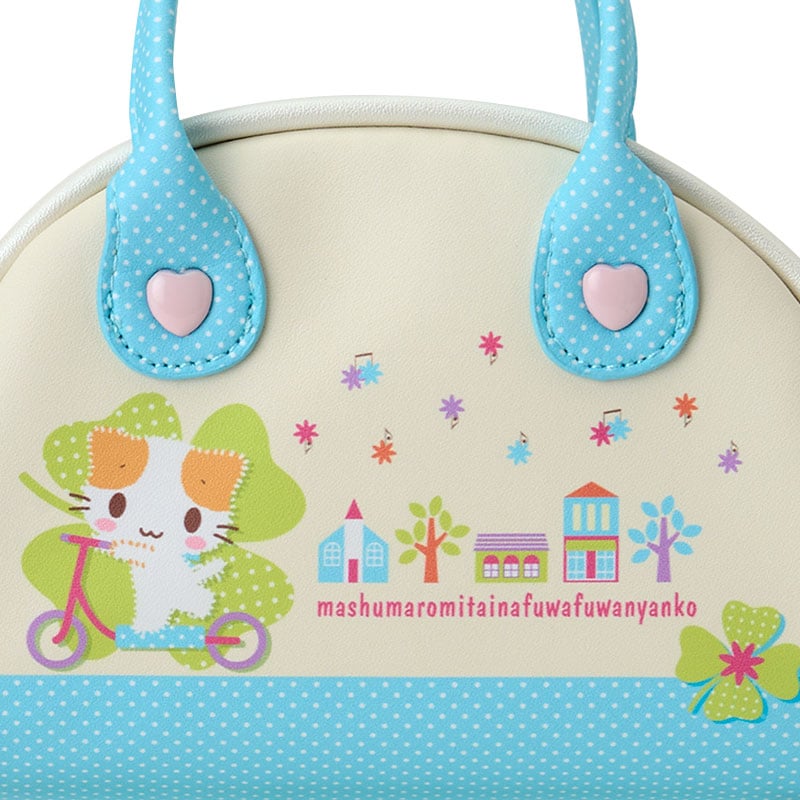 Close-up of internal lining and plush charm accessory