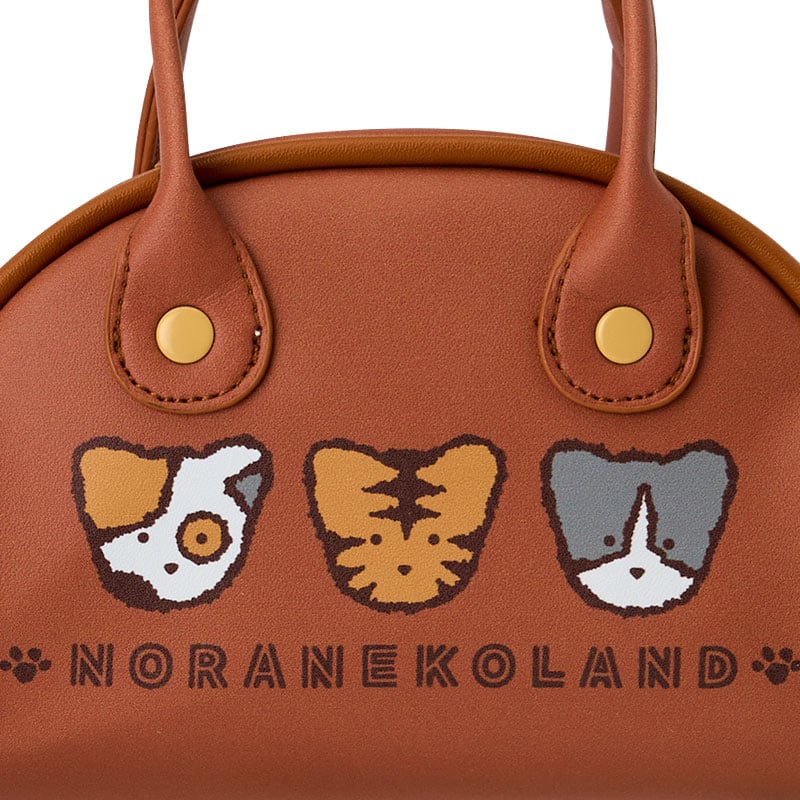 Noranekoland mini handbag displayed with plush cat charm