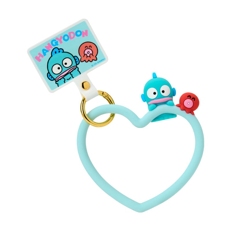 Close-up of Hangyodon Sanrio wrist strap for phones attached to a smartphone case