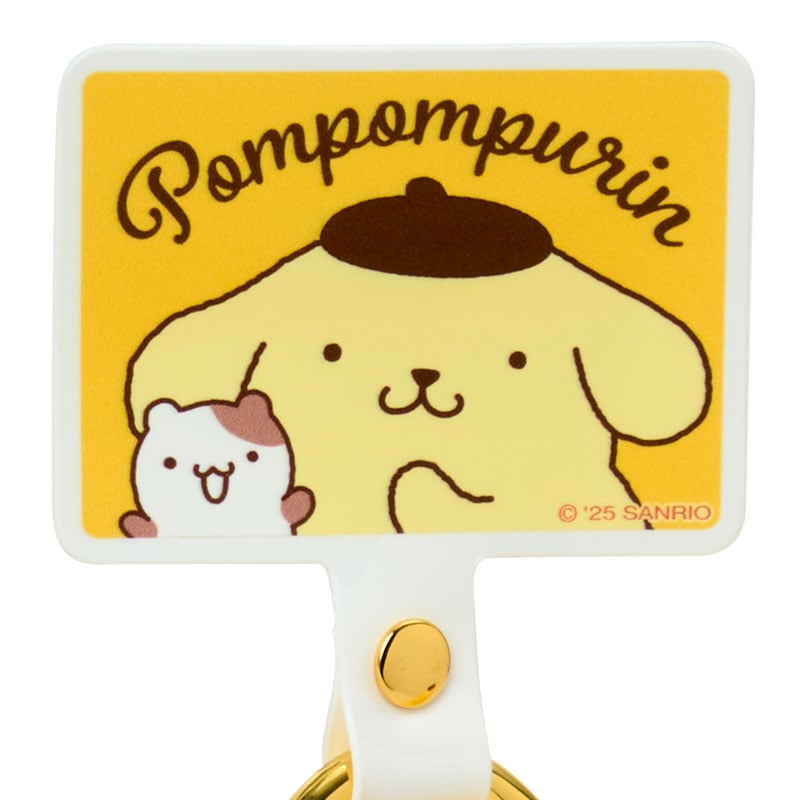 Close-up of Pompompurin phone wrist strap attached to smartphone case