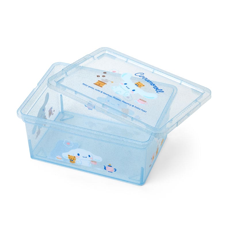 Cinnamoroll Clear Glitter Storage Bin on a desk with toys and stationery inside