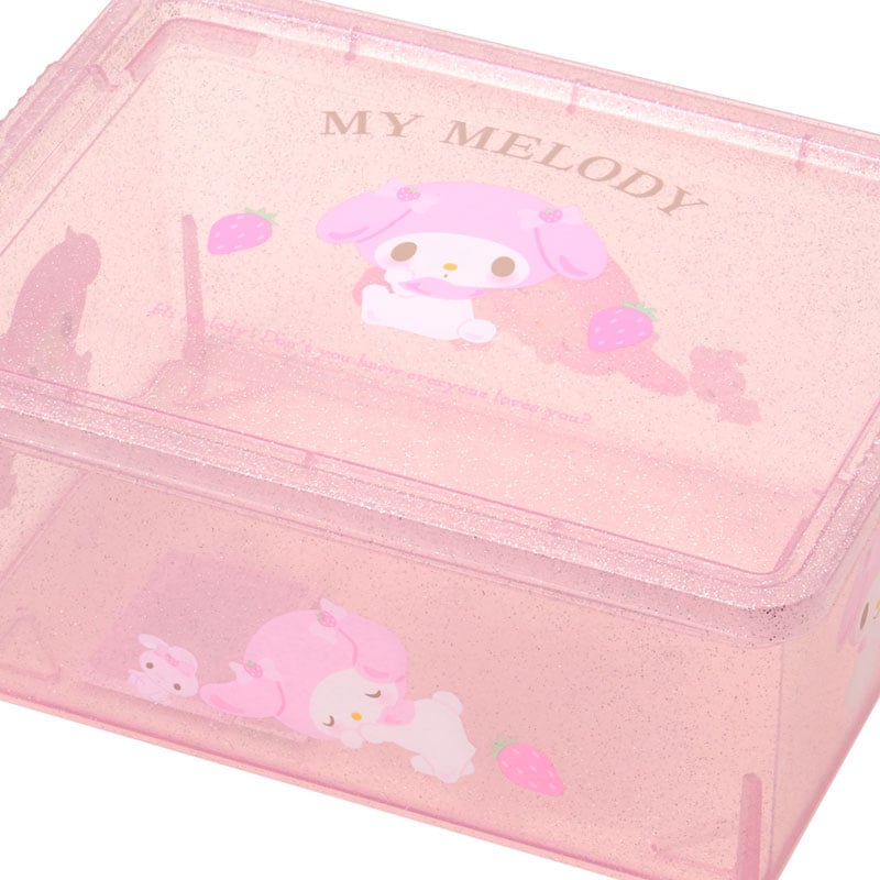 My Melody clear storage bin filled with colored pens and notebooks