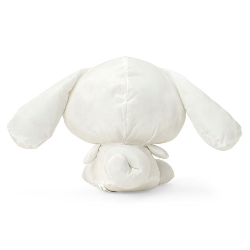 Cinnamoroll 9-inch plush toy being hugged by a fan, showcasing its cuddly and soft nature.
