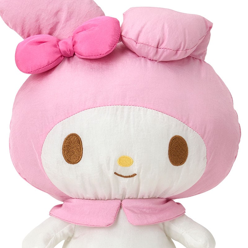 Side view of My Melody Balloon Kids plush with embroidered details