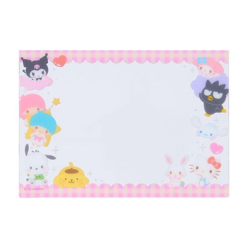 Close-up of Sanrio characters on cover with heart-shaped photo window