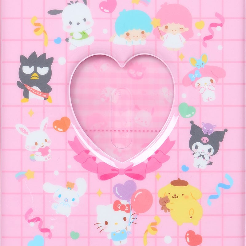 Close-up of Sanrio characters on cover with heart-shaped photo window
