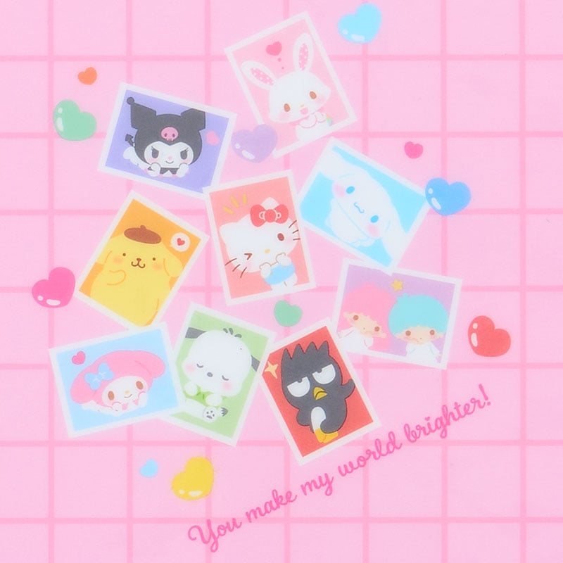 Open Sanrio photo album showing clear pages for scrapbooking and memory preservation