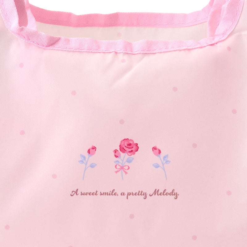 Reusable lunch tote bag with character design, folded and stored