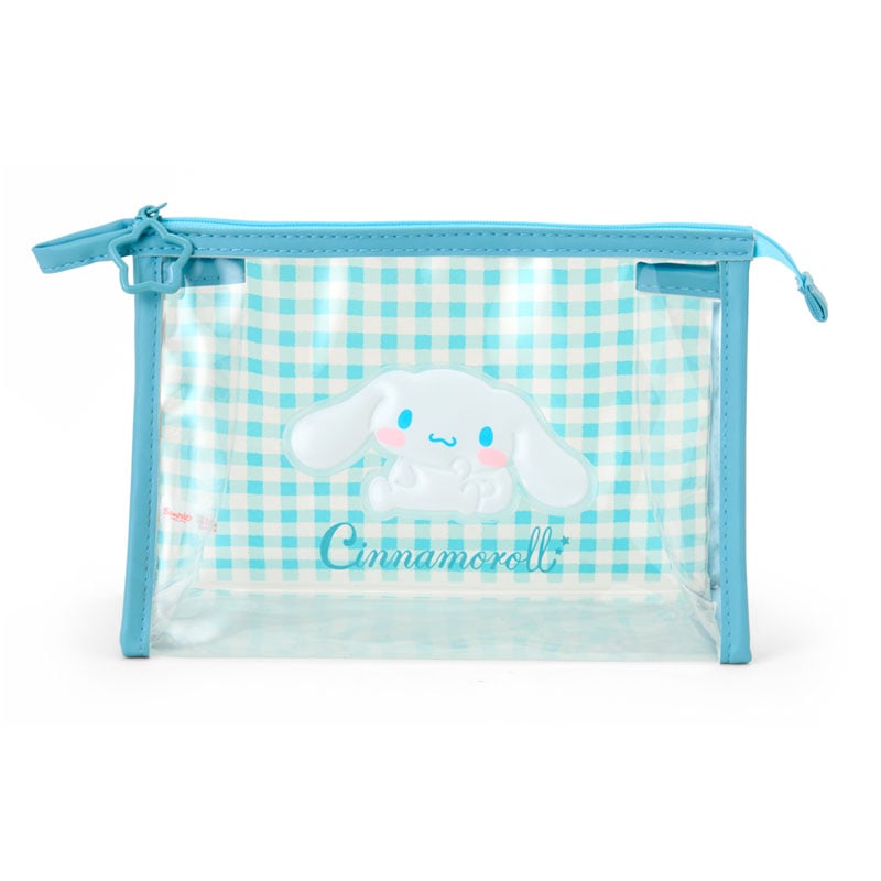 Cinnamoroll clear gingham pouch with O-ring zipper, used as a cosmetic bag on a vanity.