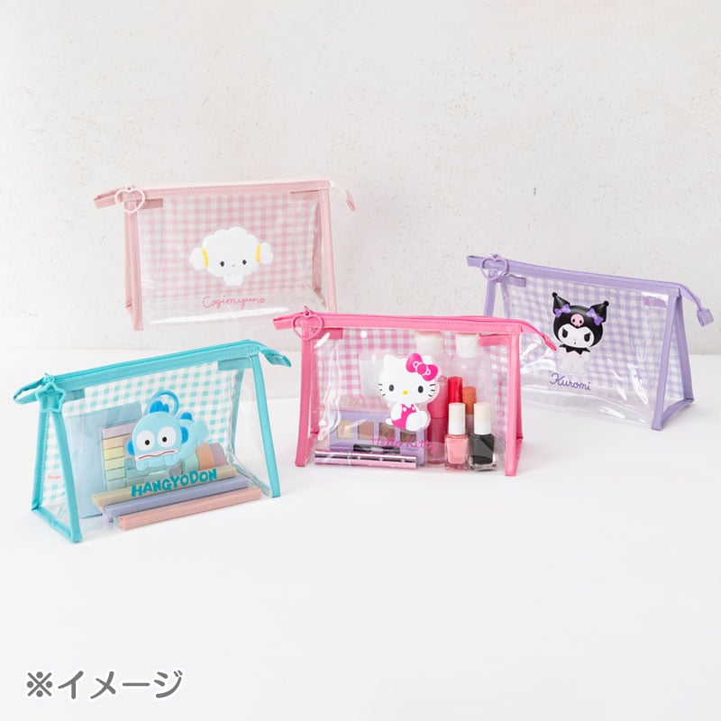 Cinnamoroll clear gingham pouch with O-ring zipper, used as a cosmetic bag on a vanity.