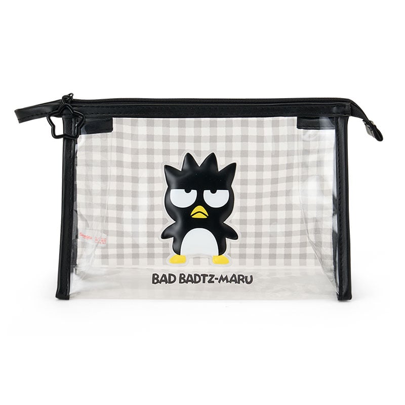 Front angle of Badtz-Maru cosmetic pouch placed inside a handbag.