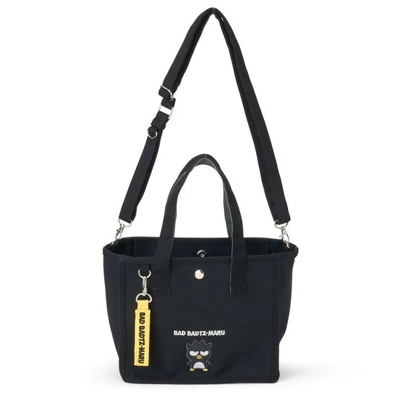 Badtz-Maru tote bag styled with accessories for a trendy look.