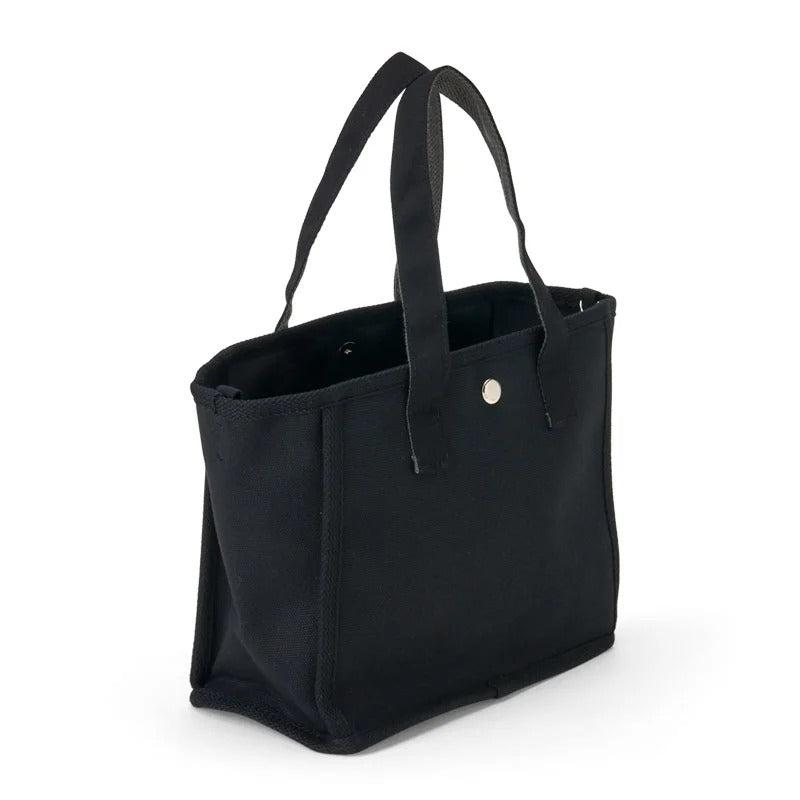 Front view of Badtz-Maru mini tote bag showcasing embroidered details.