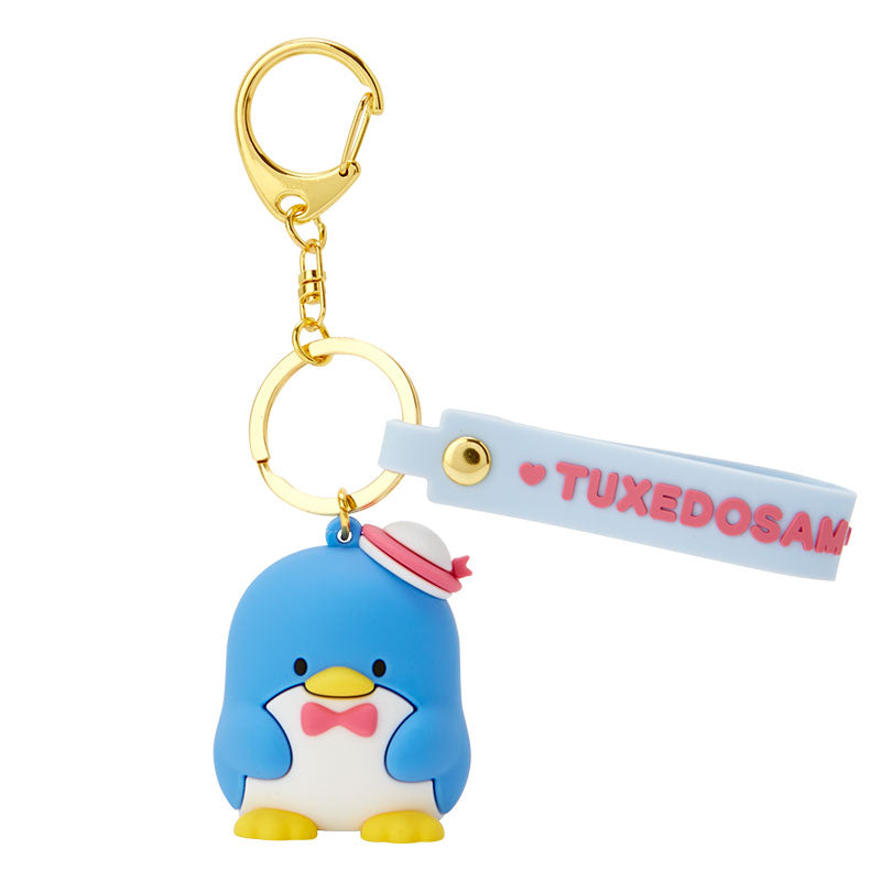 Tuxedosam Sanrio keychain close-up, highlighting the molded mascot and gold lobster clasp.