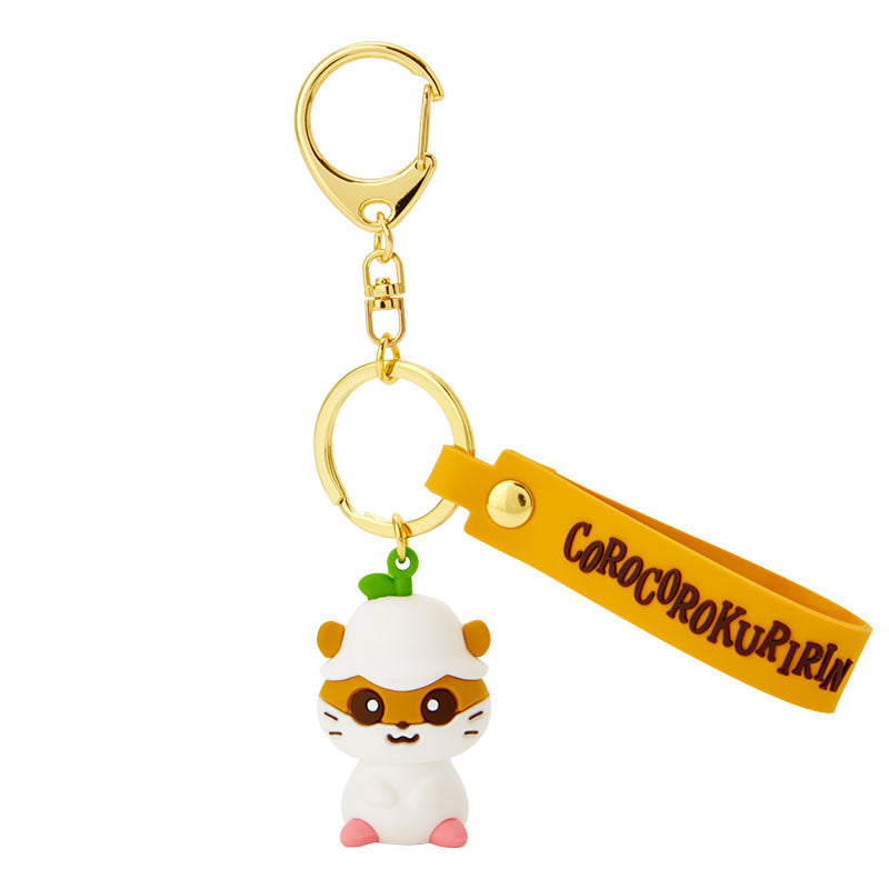Front view of the Sanrio Corocorokuririn keychain showcasing its colorful design.