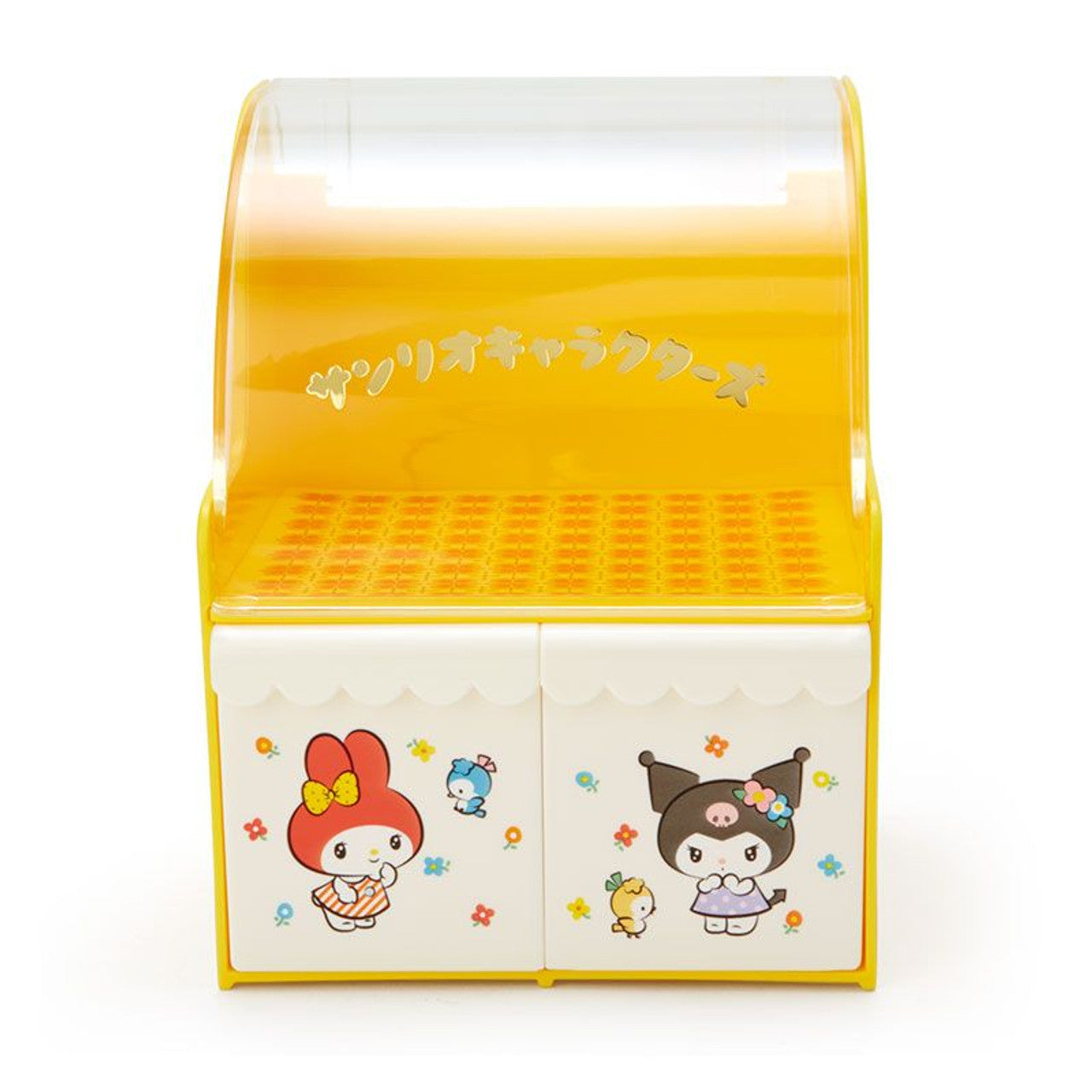 Angled view of the mini yellow storage chest with Sanrio artwork and clear lid