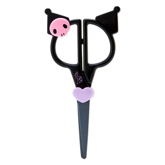 Close-up of Kuromi craft scissors cutting patterned paper