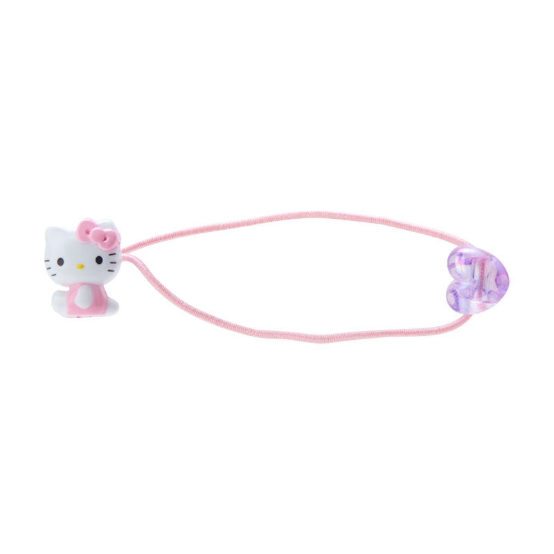 Front view of the Hello Kitty hair tie with holographic heart charm.